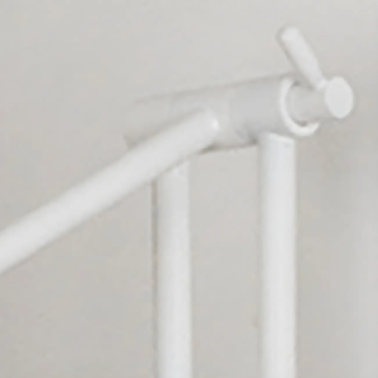 Minimalist White Swing Arm Wall Light for Bedside Reading