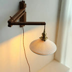 Minimalist Swing Arm Wall Mount Light for Interior Spaces