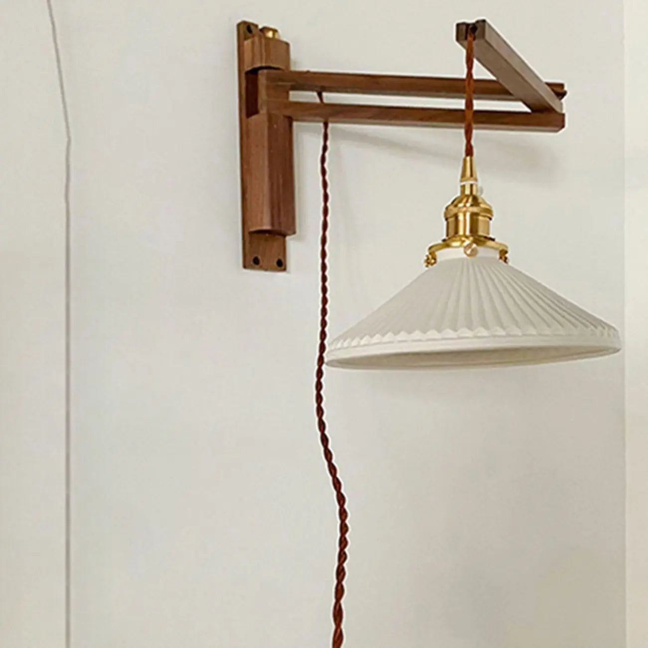 Minimalist Swing Arm Wall Mount Light for Interior Spaces